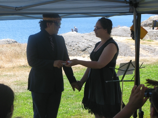 a teacher reflects on a student's growth at an Oak and Orca School graduation ceremony