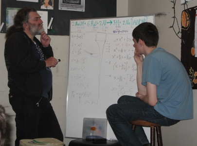 A high school student and teacher thinking about chemistry inquiry